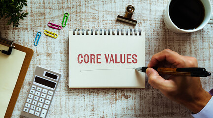 Wall Mural - There is notebook with the word Core values. It is an abbreviation for Core values as eye-catching image.