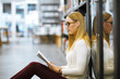 © FotoPush/peopleimages.com - Research, book and reading with woman in library for scholarship, knowledge and learning. Education, university and exam with person studying on college campus for project, academy or school resource