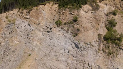 Wall Mural - Aerial drone footage of a Oasa Lake from Sureanu mountains, Alba county, Transalpina, Transylvania, Romania. Wild nature and landscape from above