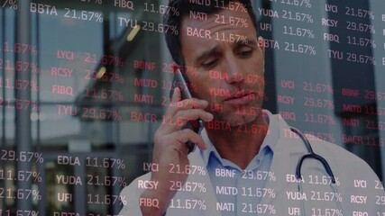 Canvas Print - Animation of stock market and diagrams over caucasian male doctor talking on smartphone