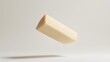 © Mr image - 35. **A 3D render of a falling slice of miso, its soft, beige texture detailed against a pristine white surface