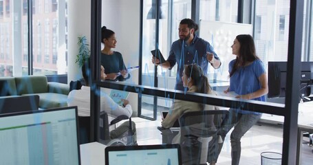 Canvas Print - Animation of diagrams over diverse business people at meeting