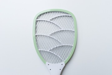 green mosquito swatter isolated on white background