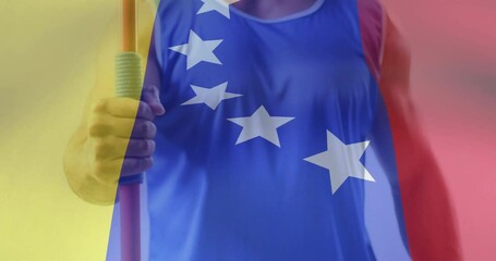 Wall Mural - Animation of flag of venezuela over biracial male athlete