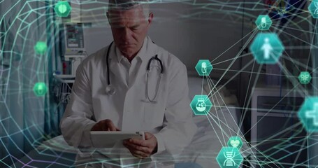 Poster - Animation of globe with connections with icons over caucasian male doctor with tablet