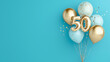 © Athiphat - Banner with number 50 golden balloon with copy space. Fifty years anniversary celebration concept on a blue background.