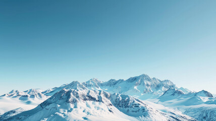 Snow-capped mountain peaks under clear blue sky with distant horizons