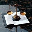 © ArtisticSnap - Elegant law scales on a legal document, symbolizing justice and balance in legal matters, set against a stylish marble surface.