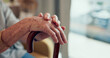 © David/peopleimages.com - Hands, walking stick and couch in home for senior person with disability, mobility and recovery from stroke. Elderly care, cane and support for steps, balance and relax on living room sofa in house