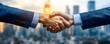 © Phichaphat - Business Handshake Deal Agreement Cityscape Background