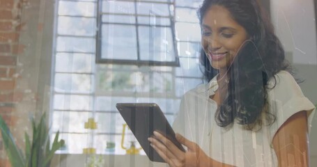 Poster - Animation of data processing and diagrams over biracial businesswoman using tablet
