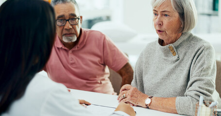 Canvas Print - Doctor, consultation and discussion with elderly couple for insurance or healthcare policy at hospital. Medical employee, caregiver or nurse with senior patients for health prescription at clinic