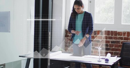 Wall Mural - Animation of financial data processing over caucasian businesswoman in office