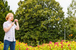 © Voyagerix - Man blowing soap bubbles, having fun