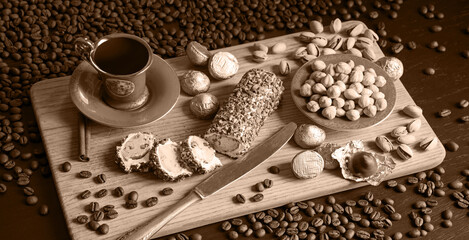 Wall Mural - Sweets on the background of coffee on the table