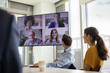 © ReeldealHD images - Businesspeople having a video conference in an office