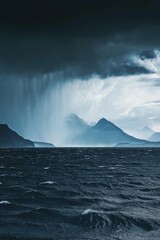 Wall Mural - A stormy ocean with a mountain in the background. The sky is dark and cloudy. Scene is intense and dramatic