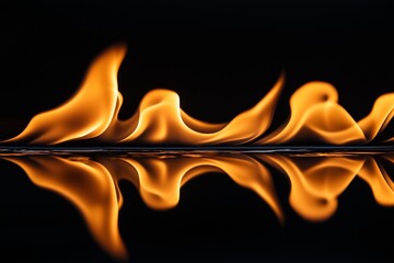 Wall Mural - A reflection of a flame in a body of water. The reflection is distorted and elongated, creating a sense of movement and energy. The image conveys a feeling of warmth and intensity