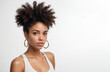 © DariaTrofimova - Young African American woman with voluminous curly hair on white background