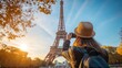 © WhataWin - A girl takes a photo of the Eiffel Tower in Paris