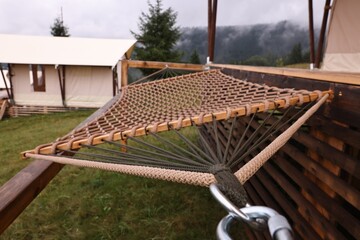 Poster - Comfortable net hammock in glamping site, closeup