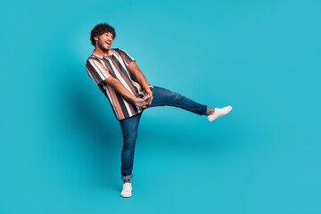 Sticker - Full size photo of nice young man good mood dancing wear shirt isolated on teal color background