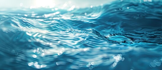 Aufkleber - Textured backdrop of waves on light blue water illuminated by sunlight Represents tranquility and relaxation Close up with selective focus and defocus. with copy space image