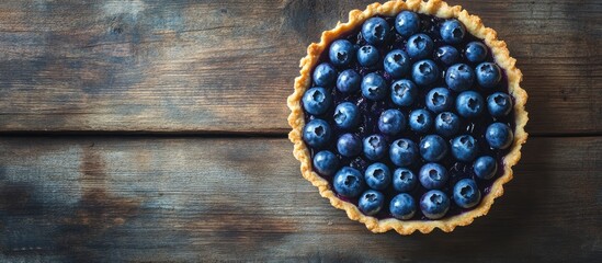 Aufkleber - Blueberry tart on a wooden surface top view copy space