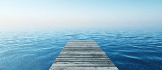 Aufkleber - Pier extending toward the horizon over blue water. with copy space image. Place for adding text or design