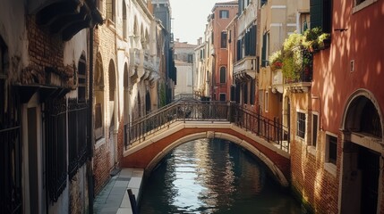 Canvas Print - A serene canal scene in Venice with a charming bridge and colorful buildings.