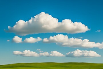 Clear blue sky with a few fluffy clouds and a green landscape below