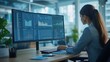 © saranya - businesswoman sit at desk with large, computer screen displaying financial data, including charts, graphs, and tables