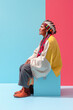 © dvoevnore - Middle aged native american man in traditional clothing isolated on color background