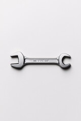 metal adjustable wrench on white background