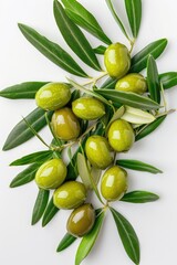 Poster - Fresh green olives surrounded by leaves on a white surface