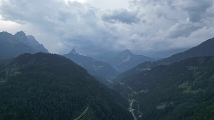 Canvas Print - Mountain valley under a cloudy sky