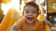 © MarkFinal - child with a huge smile, sliding down a playground slide, the sun casting a warm glow on their joyful face