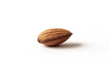 Poster - A single almond on a white surface