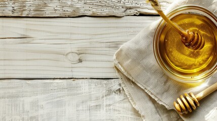 Poster - a bowl with honey and a wooden spoon 