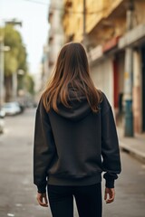 Wall Mural - Street adult woman hood.