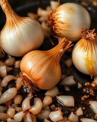 onions and onions are cooking in a skillet on a stove.