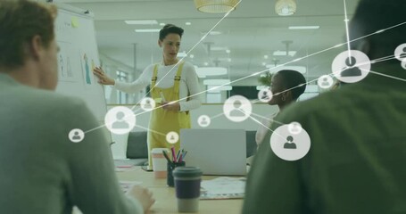 Wall Mural - Animation of network of connections with people icons over diverse business people in office