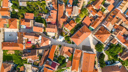 Šibenik is a stunning coastal city in Croatia, known for its rich history and beautiful architecture. Captured from the air, the city showcases its three majestic fortresses