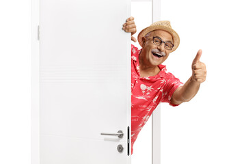 Happy mature male tourist opening a door