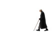 © Oratai - An elderly person with a walking cane slowly making their way up stairs, isolated on white background