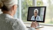 © pornchan - Senior woman using telehealth services to consult with a doctor, modern public health access, elderly telehealth, remote healthcare