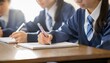 © Tunvola - 勉強している学生の手元