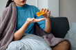 © aksonsat - Sick woman is taking pills and water for helping healing illness as per prescription from doctor and pharmacy