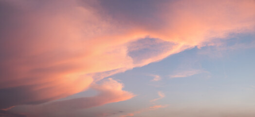 Wall Mural - beautiful sunset scenery with pink lighted soft clouds