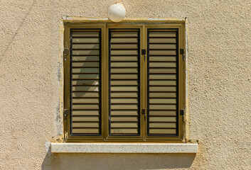 Curtains, blinds on the windows outside the establishment